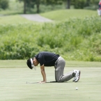 miki ryoma reacts after missing the berdie putt which posible winning or a tied and play off