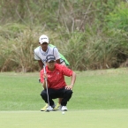 jay bayron study his line in 10 with his brother caddie