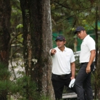 north team pucay pointing the direction where the ball plae with his partner alido in hole 9