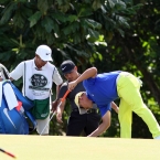 angelo que checking the ball of tabuena in hole 3