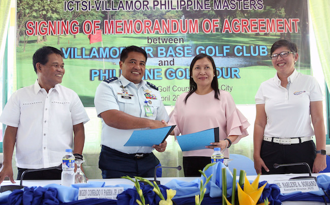 MGen. Conrado Parra Jr. (second from left) shakes hand with Philippine Golf Tour Inc. executive director Narlene Soriano after signing the Memorandum of Agreement formalizing the return of the Philippine Masters to its home at the Villamor Golf Club with ICTSI as the major sponsor. Others in photo are retired Col. And VGC general manager Oscar Calingasan and PGTI general manager Colo Ventosa.