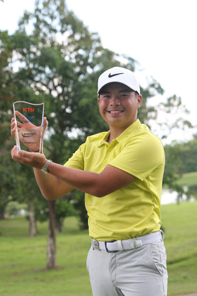Miguel Tabuena beams after clinching the ICTSI Luisita Championship via a playoff victory over South African Mathiam Keyser.