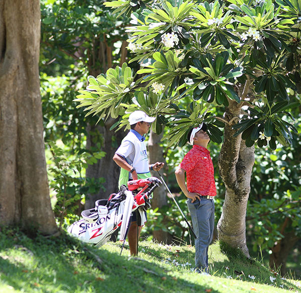 Jay Bayron figures out his options from a troubled lie on No. 1.