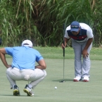 abdon pro while his amateur a former pro sangil checking the ball allignment in 7