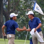 quiban and gallardo after scores hole 12