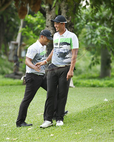 Michael Bibat (right) and Miguel Ochoa celebrate their final hole victory over Elmer Salvador and Arnold Villacencio in the opening foursomes of The Duel 4 at Wack Wack.